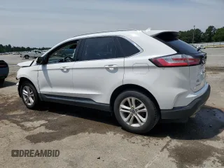 2020 Ford Edge SEL z VIN 2FMPK3J99LBA57125, wystawiony jako Copart lot #59915095 z przebiegiem 101 081 mil mil oraz Szkoda całkowita • Salvage title. Historia ofert i sprzedaży dostępna na DreamBid. Obrazek 2.