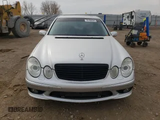 2005 Mercedes-Benz E-Class 5.5L AMG with VIN WDBUF76J05A730404, listed as a Copart auction lot 78168554 with 154,164 mi miles and Clean Title. Bid and sale history available at carsss.com. Image 5.