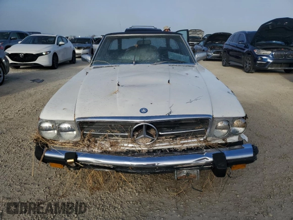 1980 Mercedes-Benz SL with VIN 10704412062529, listed as a Copart auction lot 77941784 with Not provided miles and Salvage title. Bid and sale history available at DreamBid. Image 5.