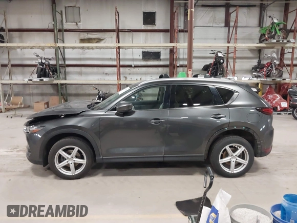 2020 Mazda CX-5 Grand Touring with VIN JM3KFBDM3L0739763, listed as a IAAI auction lot 41751250 with 88,063 mi miles and . Bid and sale history available at carsss.com. Image 14.
