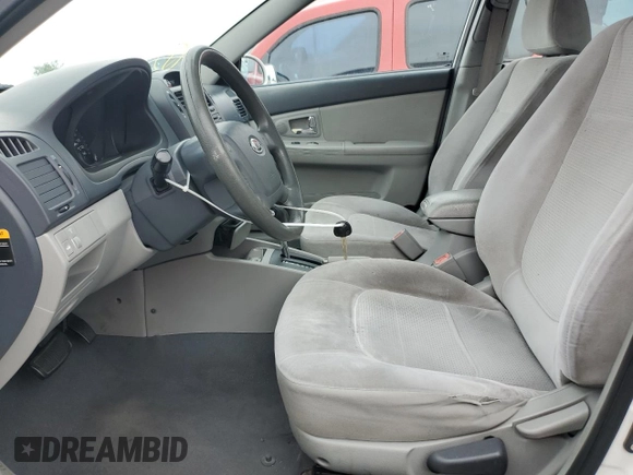 2008 Kia Spectra EX with VIN KNAFE122885580609, listed as a Copart auction lot 54198115 with Not Provided miles and Salvage Title. Bid and sale history available at DreamBid. Image 7.