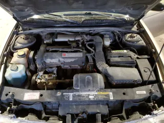 1999 Saturn SL z VIN 1G8ZK5277XZ266298, wystawiony jako Copart lot #41371855 z przebiegiem 85 882 mil mil oraz Szkoda całkowita • Salvage title. Historia ofert i sprzedaży dostępna na DreamBid. Obrazek 11.