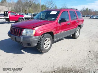 2003 Jeep Grand Cherokee Laredo with VIN 1J4GW48S33C556441, listed as a IAAI auction lot 42026804 with 189,143 mi miles. Bid and sale history available at carsss.com. Image 2.