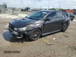 2011 Mitsubishi Lancer Evolution GSR with VIN JA32W8FV3BU046151, listed as a Copart auction lot 71041064 with 96,926 mi miles and Salvage Title. Bid and sale history available at carsss.com. Image 1.