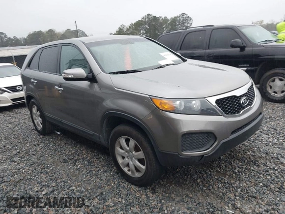 2012 Kia Sorento LX with VIN 5XYKT3A19CG244821, listed as a IAAI auction lot 41862626 with 243,165 mi miles. Bid and sale history available at carsss.com. Image 1.