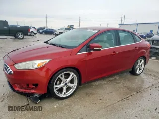 2015 Ford Focus Titanium z VIN 1FADP3J27FL334148, wystawiony jako Copart lot #58520965 z przebiegiem 191 870 mil mil oraz Czysty tytuł • Clean title. Historia ofert i sprzedaży dostępna na DreamBid. Obrazek 1.