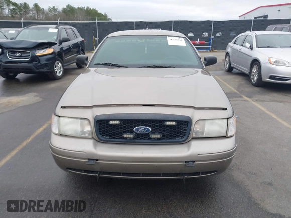 2009 Ford Police Interceptor with VIN 2FAHP71V39X123653, listed as a IAAI auction lot 41538732 with 306,400 mi miles and . Bid and sale history available at DreamBid. Image 12.