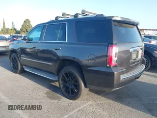2015 GMC Yukon Denali z VIN 1GKS1CKJ7FR566419, wystawiony jako IAAI lot #41948825 z przebiegiem 235 037 mil mil oraz . Historia ofert i sprzedaży dostępna na DreamBid. Obrazek 3.