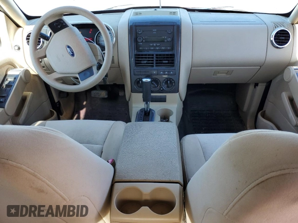 2007 Ford Explorer Sport Trac XLT with VIN 1FMEU51887UA09474, listed as a Copart auction lot 57625115 with 128,443 mi miles and Salvage title. Bid and sale history available at DreamBid. Image 8.