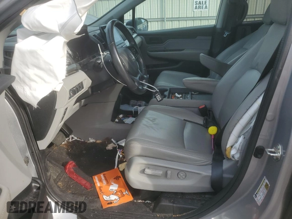 2018 Honda Odyssey EX-L with VIN 5FNRL6H74JB099282, listed as a Copart auction lot 55031025 with 137,359 mi miles and Salvage Title. Bid and sale history available at DreamBid. Image 7.