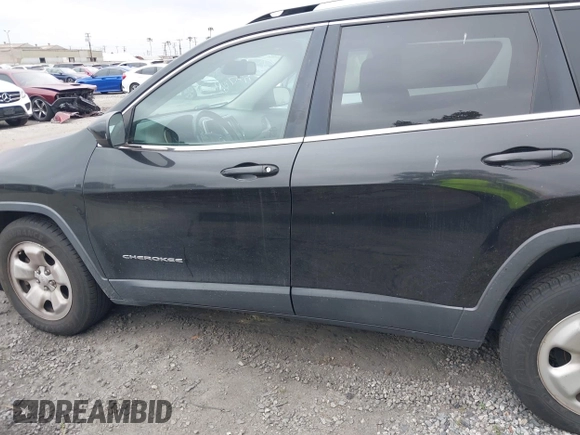 2015 Jeep Cherokee Latitude with VIN 1C4PJLCB9FW627909, listed as a IAAI auction lot 42034667 with 131,739 mi miles and . Bid and sale history available at carsss.com. Image 15.