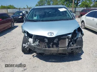 2016 Toyota Sienna XLE with VIN 5TDYK3DC9GS708693, listed as a IAAI auction lot 42231532 with 153,865 mi miles and . Bid and sale history available at DreamBid. Image 6.