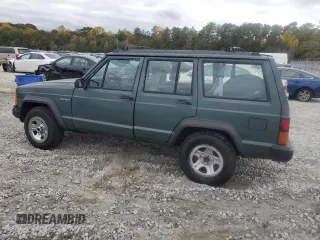 1993 Jeep Cherokee Sport with VIN 1J4FT68S4PL588241, listed as a Copart auction lot 80115884 with 204,174 mi miles and Salvage Title. Bid and sale history available at carsss.com. Image 2.