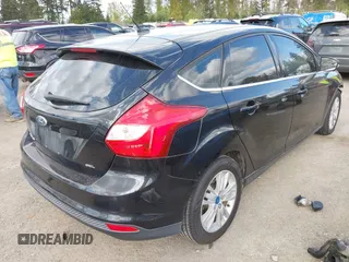 2012 Ford Focus SEL with VIN 1FAHP3M2XCL106248, listed as a IAAI auction lot 42088933 with 117,333 mi miles. Bid and sale history available at carsss.com. Image 4.