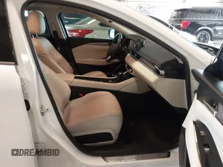 2021 Mazda 6 Carbon Edition with VIN JM1GL1WY9M1614117, listed as a IAAI auction lot 41305576 with 54,670 mi miles and . Bid and sale history available at DreamBid. Image 5.