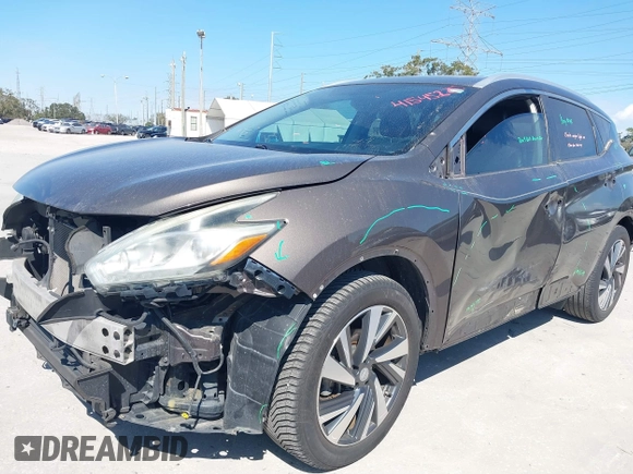 2015 Nissan Murano Platinum z VIN 5N1AZ2MG7FN230347, wystawiony jako IAAI lot #41545220 z przebiegiem 134 435 mil mil oraz . Historia ofert i sprzedaży dostępna na DreamBid. Obrazek 6.