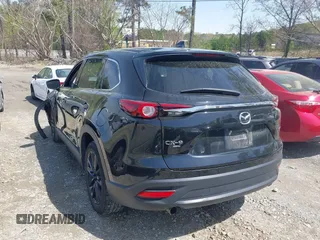 2023 Mazda CX-9 Touring Plus with VIN JM3TCBAY9P0657854, listed as a IAAI auction lot 41931409 with 54,036 mi miles and . Bid and sale history available at DreamBid. Image 3.