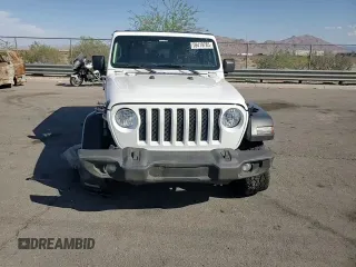 2020 Jeep Wrangler Unlimited Sport S z VIN 1C4HJXDG4LW209887, wystawiony jako Copart lot #59419785 z przebiegiem 89 138 mil mil oraz Szkoda całkowita • Salvage title. Historia ofert i sprzedaży dostępna na DreamBid. Obrazek 13.