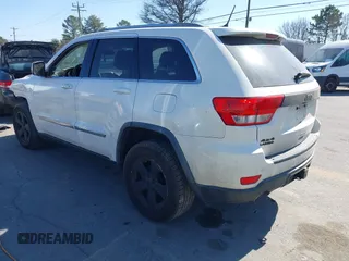 2012 Jeep Grand Cherokee Laredo with VIN 1C4RJFAT4CC229204, listed as a IAAI auction lot 41659491 with 141,143 mi miles. Bid and sale history available at carsss.com. Image 3.