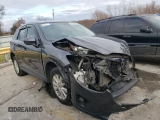 2015 Mazda CX-5 Touring with VIN JM3KE4CY2F0449733, listed as a Copart auction lot 81720843 with 123,967 mi miles and Salvage Title. Bid and sale history available at carsss.com. Image 4.