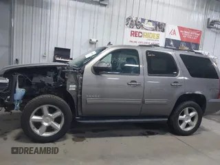 2011 Chevrolet Tahoe LT with VIN 1GNSKBE03BR268246, listed as a IAAI auction lot 41434862 with 250,991 mi miles and . Bid and sale history available at DreamBid. Image 15.