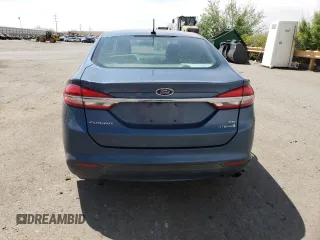 2018 Ford Fusion SE z VIN 3FA6P0LU1JR232876, wystawiony jako Copart lot #52911185 z przebiegiem 116 889 mil mil oraz Nie do naprawy • Non repairable. Historia ofert i sprzedaży dostępna na DreamBid. Obrazek 6.