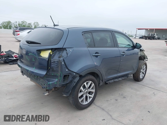 2015 Kia Sportage LX with VIN KNDPB3AC9F7754016, listed as a IAAI auction lot 41938311 with 71,737 mi miles and . Bid and sale history available at DreamBid. Image 4.