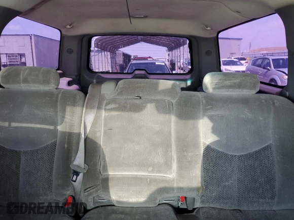 2005 Chevrolet Suburban LS with VIN 3GNEC16Z25G104721, listed as a Copart auction lot 55809235 with 236,590 mi miles and Salvage title. Bid and sale history available at DreamBid. Image 10.