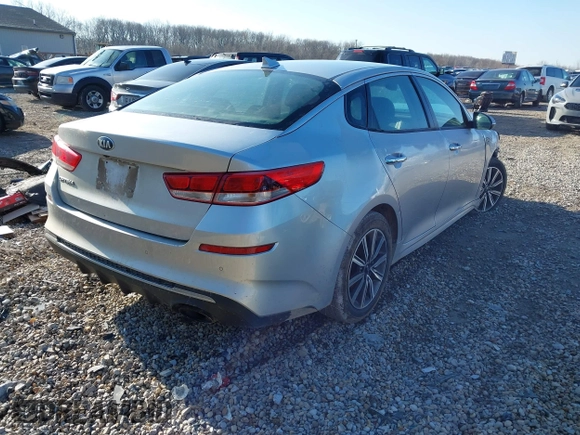 2019 Kia Optima LX with VIN 5XXGT4L35KG359896, listed as a IAAI auction lot 41849243 with 140,975 mi miles. Bid and sale history available at carsss.com. Image 4.