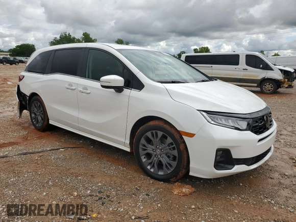 2025 Honda Odyssey Touring with VIN 5FNRL6H8XSB039033, listed as a Copart auction lot 56111255 with 4,842 mi miles and Salvage title. Bid and sale history available at DreamBid. Image 4.