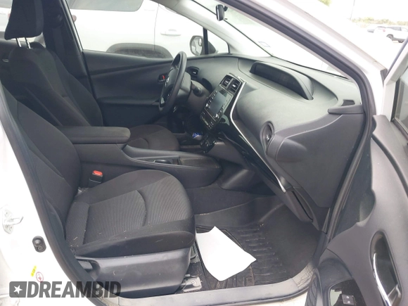 2021 Toyota Prius L Eco with VIN JTDKAMFU5M3132103, listed as a IAAI auction lot 42061511 with 42,116 mi miles and . Bid and sale history available at DreamBid. Image 5.