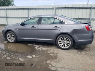 2014 Ford Taurus Limited with VIN 1FAHP2F84EG149622, listed as a Copart auction lot 63764675 with 208,801 mi miles and Salvage title. Bid and sale history available at DreamBid. Image 2.
