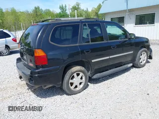 2007 GMC Envoy SLE with VIN 1GKDT13S372103718, listed as a IAAI auction lot 41886111 with 238,423 mi miles. Bid and sale history available at carsss.com. Image 4.