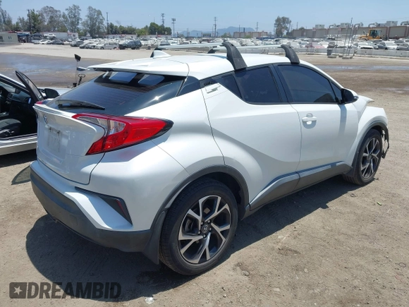 2018 Toyota C-HR XLE with VIN NMTKHMBX8JR036857, listed as a IAAI auction lot 42667018 with 63,058 mi miles and . Bid and sale history available at DreamBid. Image 4.