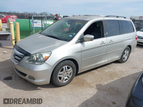 2005 Honda Odyssey EX with VIN 5FNRL38415B039809, listed as a IAAI auction lot 41884459 with 231,258 mi miles. Bid and sale history available at carsss.com. Image 2.