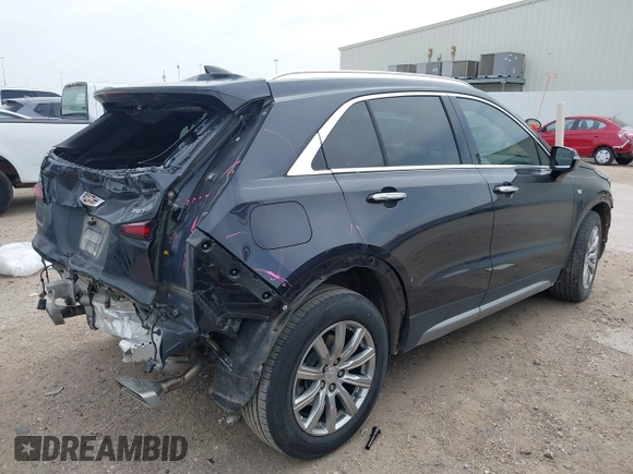 2023 Cadillac XT4 FWD Premium Luxury with VIN 1GYFZCR4XPF101409, listed as a IAAI auction lot 41891293 with 29,355 mi miles and . Bid and sale history available at carsss.com. Image 4.