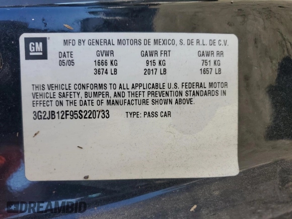 2005 Pontiac Sunfire z VIN 3G2JB12F95S220733, wystawiony jako Copart lot #74266014 z przebiegiem 208 749 mil mil oraz Szkoda całkowita • Salvage title. Historia ofert i sprzedaży dostępna na DreamBid. Obrazek 13.