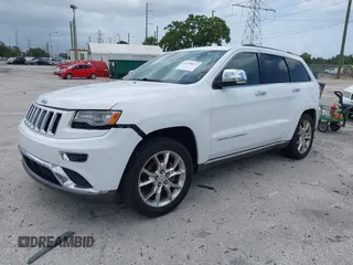 2014 Jeep Grand Cherokee Summit z VIN 1C4RJEJG1EC357948, wystawiony jako IAAI lot #42498652 z przebiegiem 213 715 mil mil oraz . Historia ofert i sprzedaży dostępna na DreamBid. Obrazek 17.