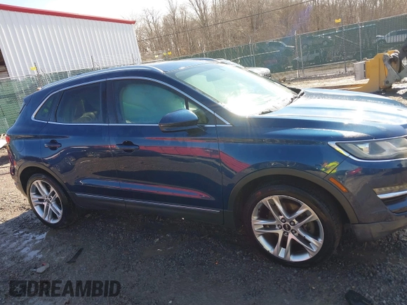 2015 Lincoln MKC with VIN 5LMTJ2AH2FUJ12531, listed as a IAAI auction lot 41639903 with 112,835 mi miles. Bid and sale history available at carsss.com. Image 13.
