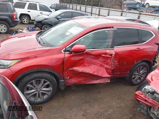 2020 Honda CR-V Touring with VIN 5J6RW2H94LL017434, listed as a IAAI auction lot 41556184 with 97,016 mi miles and . Bid and sale history available at DreamBid. Image 14.