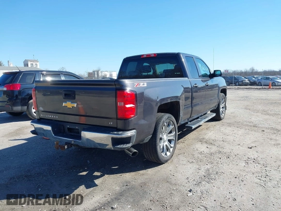 2014 Chevrolet Silverado 1500 LT with VIN 1GCVKREC0EZ377177, listed as a IAAI auction lot 41683600 with 148,672 mi miles and . Bid and sale history available at DreamBid. Image 4.