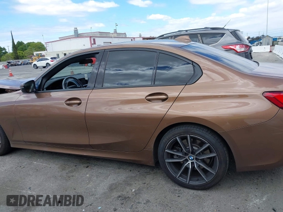 2019 BMW 3 Series 330i with VIN WBA5R1C57KAK07519, listed as a IAAI auction lot 42042379 with 40,898 mi miles and . Bid and sale history available at DreamBid. Image 14.