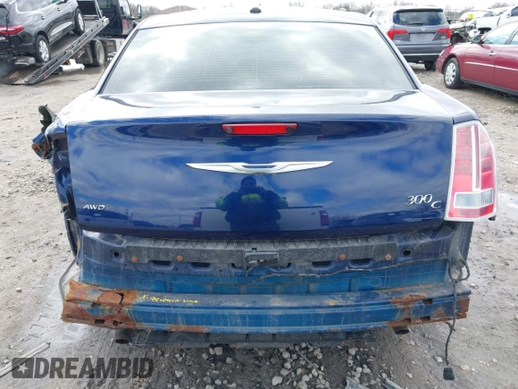 2014 Chrysler 300 C with VIN 2C3CCAKG2EH273209, listed as a IAAI auction lot 41955858 with 112,742 mi miles and . Bid and sale history available at carsss.com. Image 6.