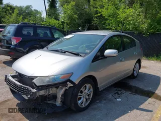 2010 Honda Insight EX with VIN JHMZE2H78AS016893, listed as a IAAI auction lot 42420778 with 207,491 mi miles and . Bid and sale history available at DreamBid. Image 2.