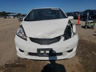 2009 Honda Fit Sport with VIN JHMGE88409S070913, listed as a Copart auction lot 58187375 with 220,913 mi miles and Salvage title. Bid and sale history available at DreamBid. Image 5.