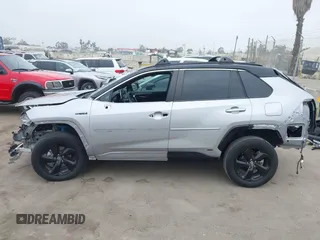 2021 Toyota RAV4 Hybrid XSE z VIN 4T3E6RFV9MU027713, wystawiony jako IAAI lot #42587759 z przebiegiem 28 806 mil mil oraz . Historia ofert i sprzedaży dostępna na DreamBid. Obrazek 15.