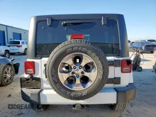 2016 Jeep Wrangler Unlimited Sahara z VIN 1C4HJWEG6GL218719, wystawiony jako Copart lot #56065235 z przebiegiem 96 061 mil mil oraz Szkoda całkowita • Salvage title. Historia ofert i sprzedaży dostępna na DreamBid. Obrazek 6.