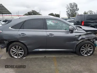 2013 Lexus RX 450h with VIN JTJBC1BAXD2063528, listed as a IAAI auction lot 41745770 with 140,605 mi miles and . Bid and sale history available at DreamBid. Image 13.