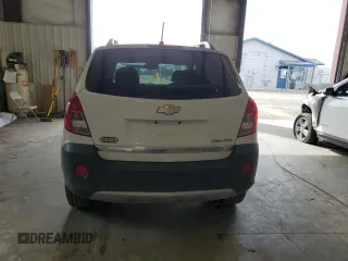2014 Chevrolet Captiva Sport LS with VIN 3GNAL2EK2ES659173, listed as a Copart auction lot 50597214 with 125,279 mi miles and Salvage Title. Bid and sale history available at DreamBid. Image 6.