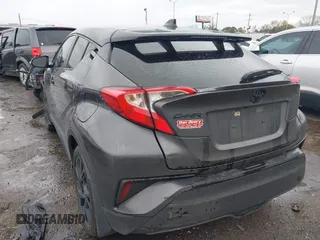 2021 Toyota C-HR LE with VIN JTNKHMBX0M1129080, listed as a IAAI auction lot 41321604 with 52,916 mi miles. Bid and sale history available at carsss.com. Image 3.